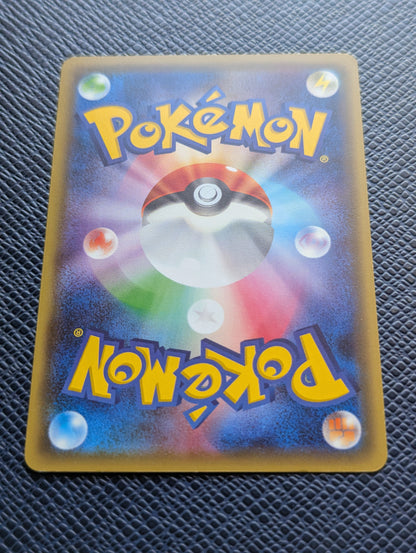 Carta Pokémon Chikorita #222/XY-P Trasera Inferior
