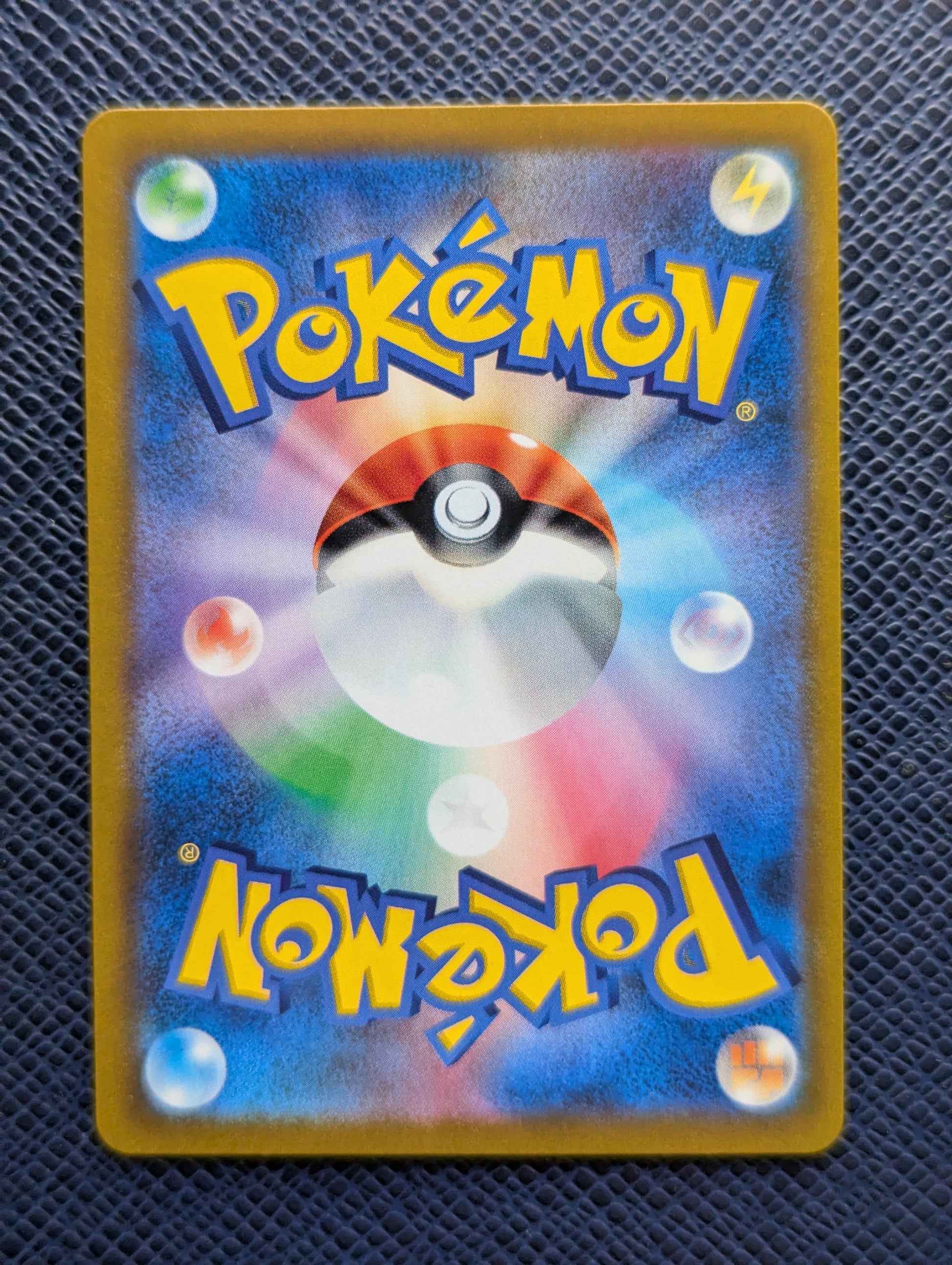 Carta Pokémon Mimikyu V #233/184 Trasera
